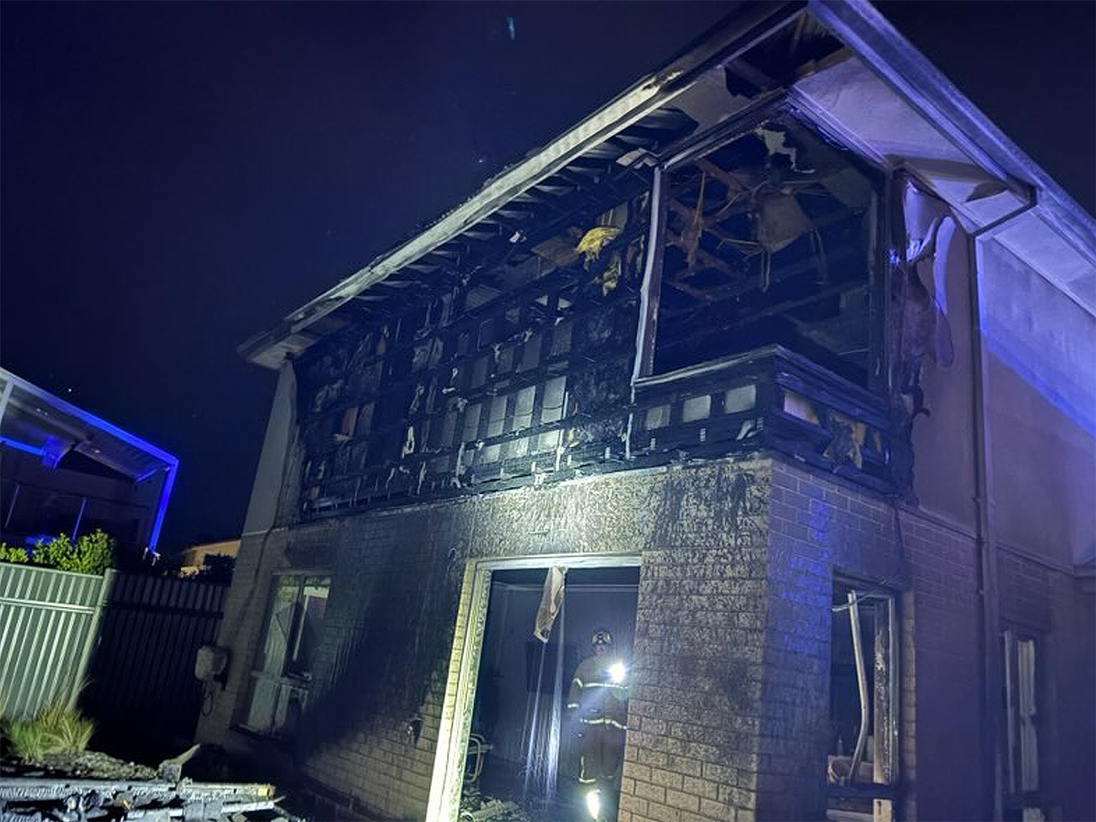 The fire was sparked by embers from a fire pit.